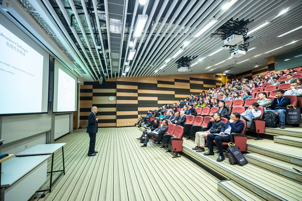 A pic of conference attendees attending a keynote speech